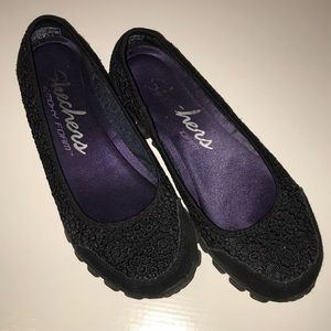 Slip on athletic flats.